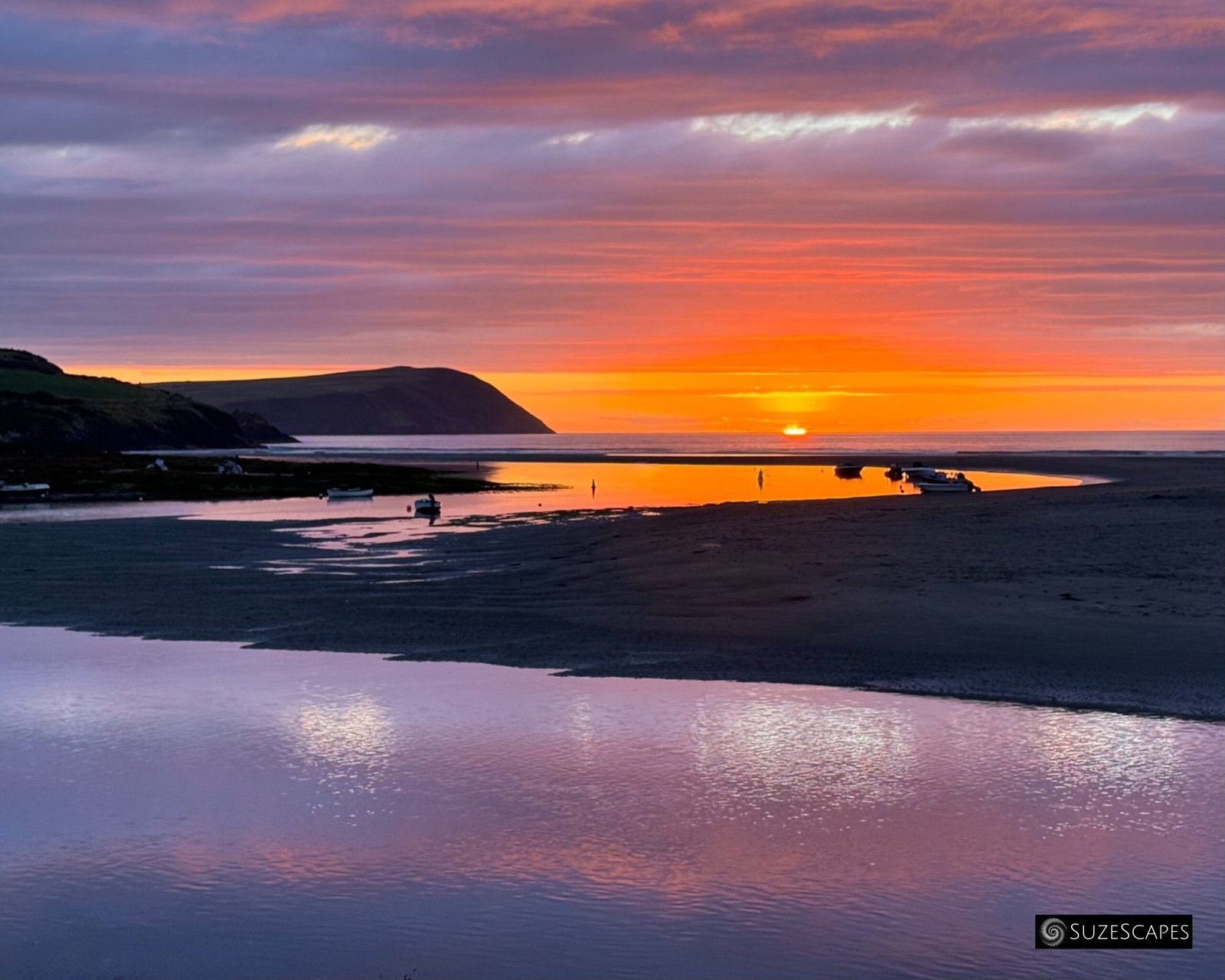 Multicoloured sunset at the Parrog in Newport, Pembrokeshire, Wales
