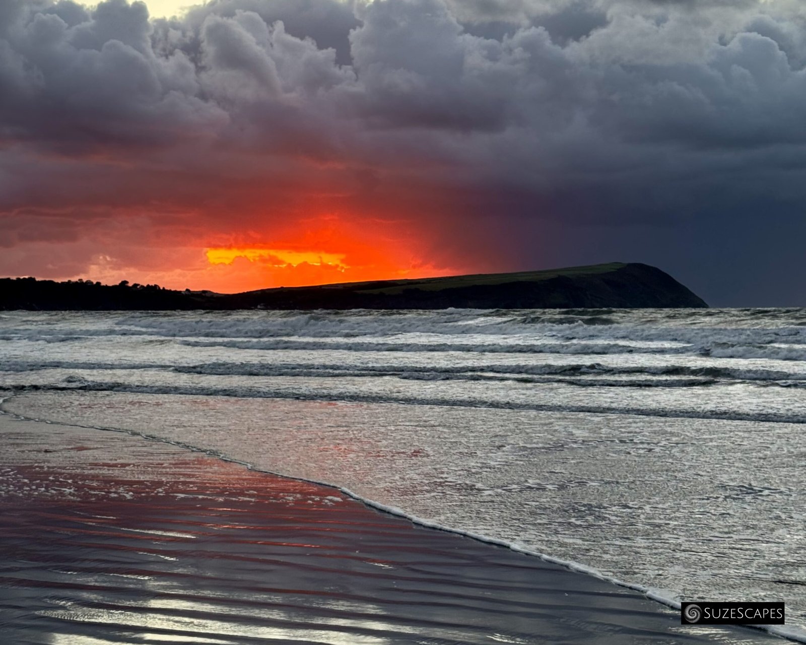 Dramatic sunset sky over Dinas Head, Pembrokeshire, Wales